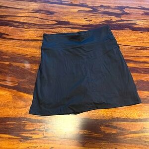 Goldhinge black mini skirt-flat front with pleated back size small